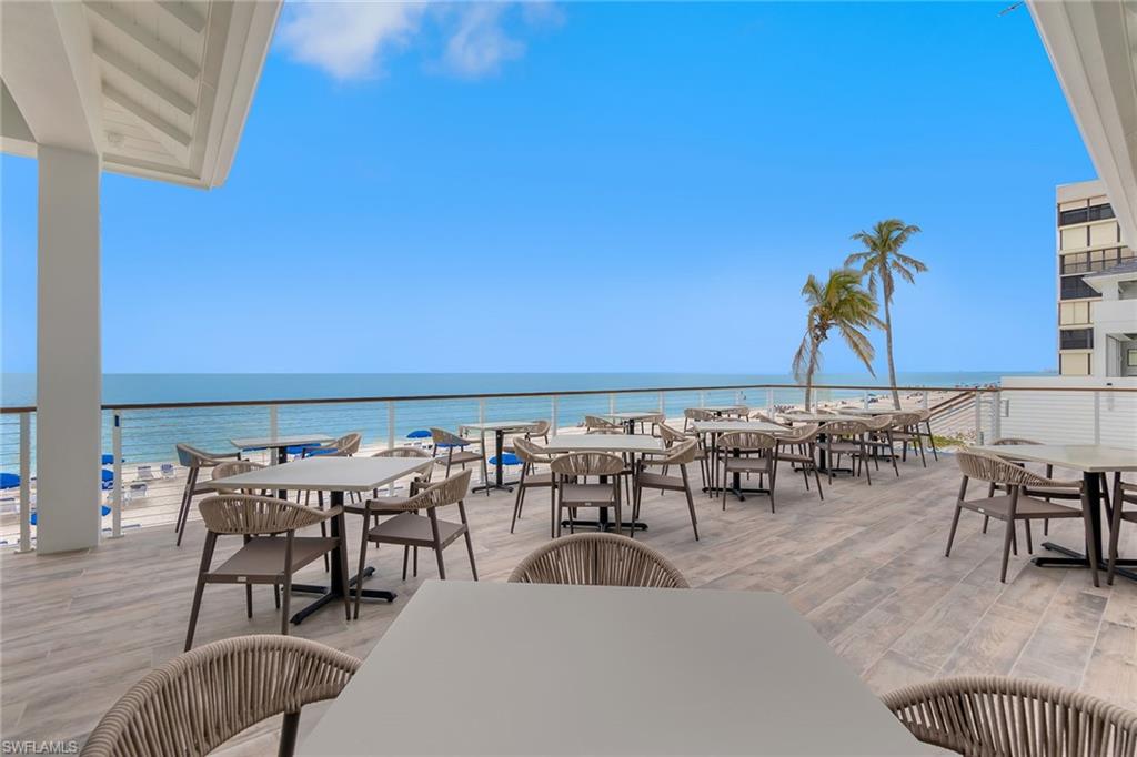 5100 Baybridge Boulevard, Unit 202 Estero, FL 33928 - Photo 37 of 38 a view of a chairs and table in patio