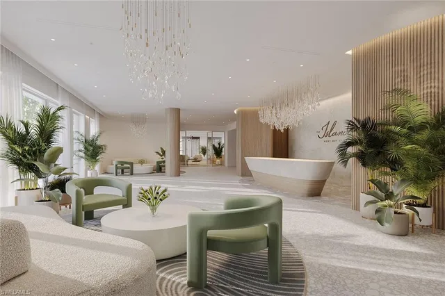 a living room with furniture potted plant and a table