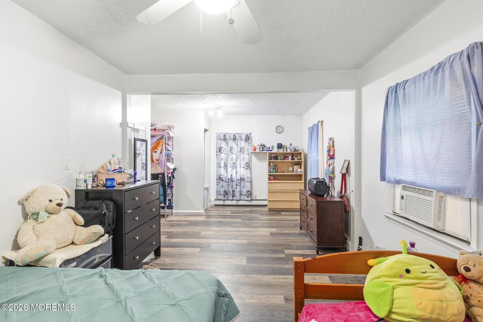 1914 Rutherford Avenue Neptune Township, NJ 07753 - Photo 11 of 25 a living room with furniture and a table