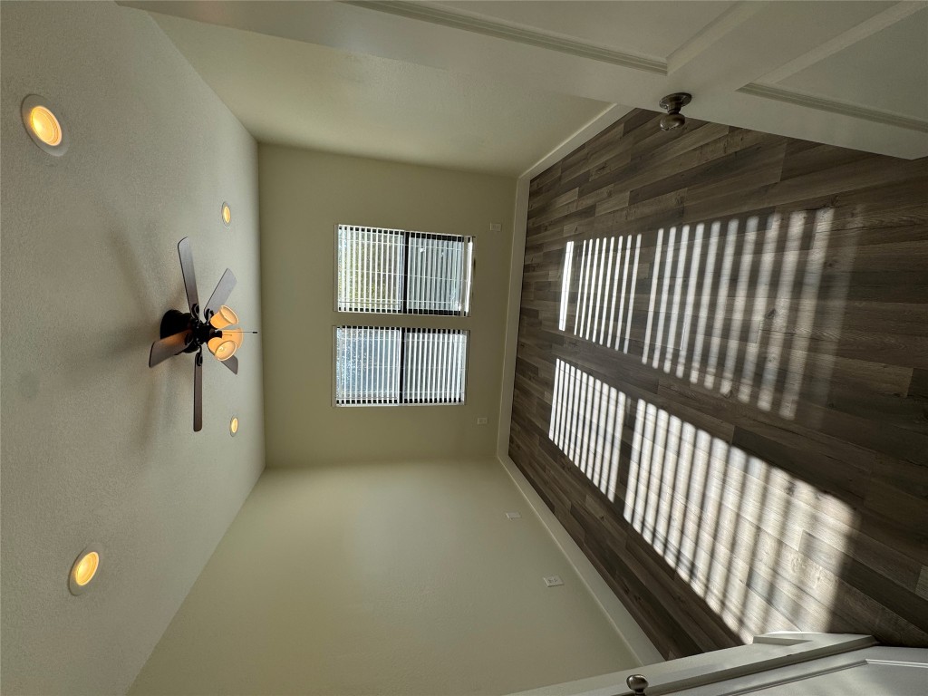 2417 West Slaughter Lane, Unit D Austin, TX 78748 - Photo 11 of 13 a view of an empty room and window