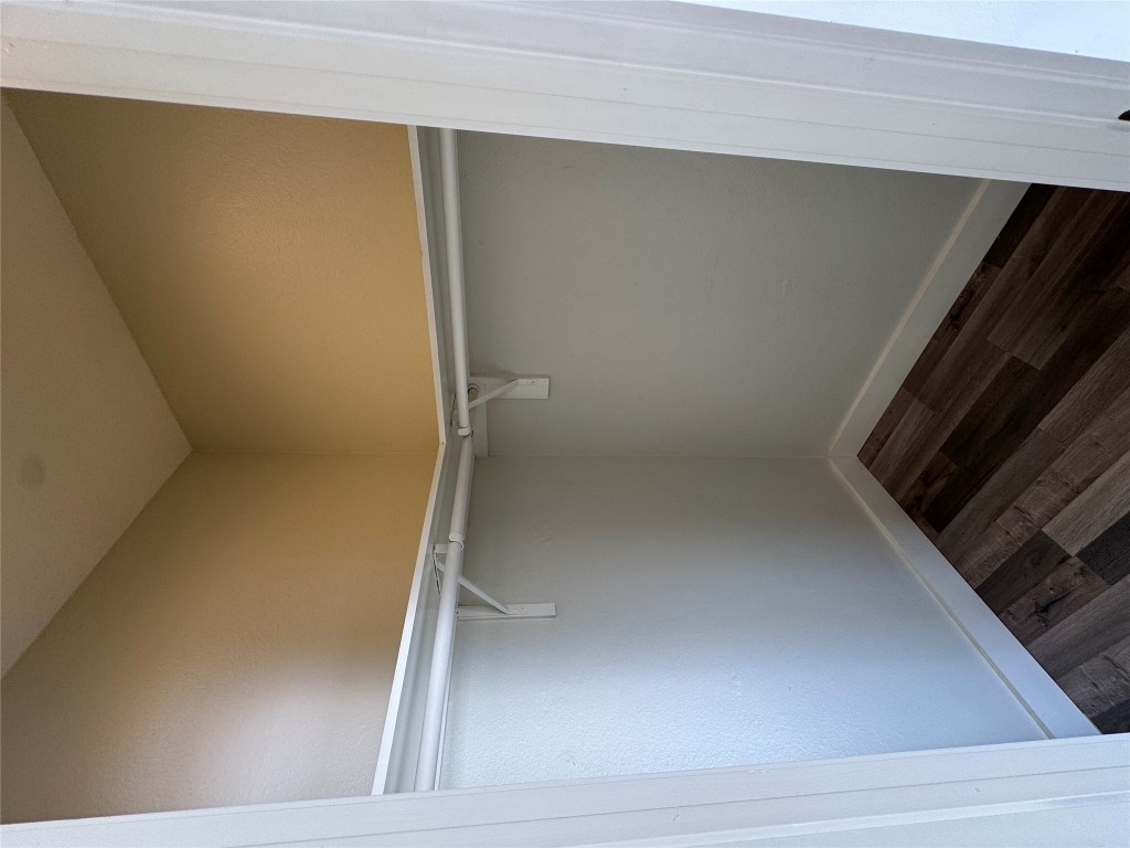 2417 West Slaughter Lane, Unit D Austin, TX 78748 - Photo 12 of 13 a small space with wooden floor