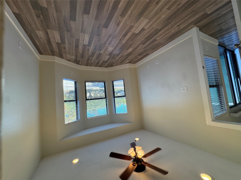 2417 West Slaughter Lane, Unit D Austin, TX 78748 - Photo 7 of 13 wooden floor in an empty room with a window