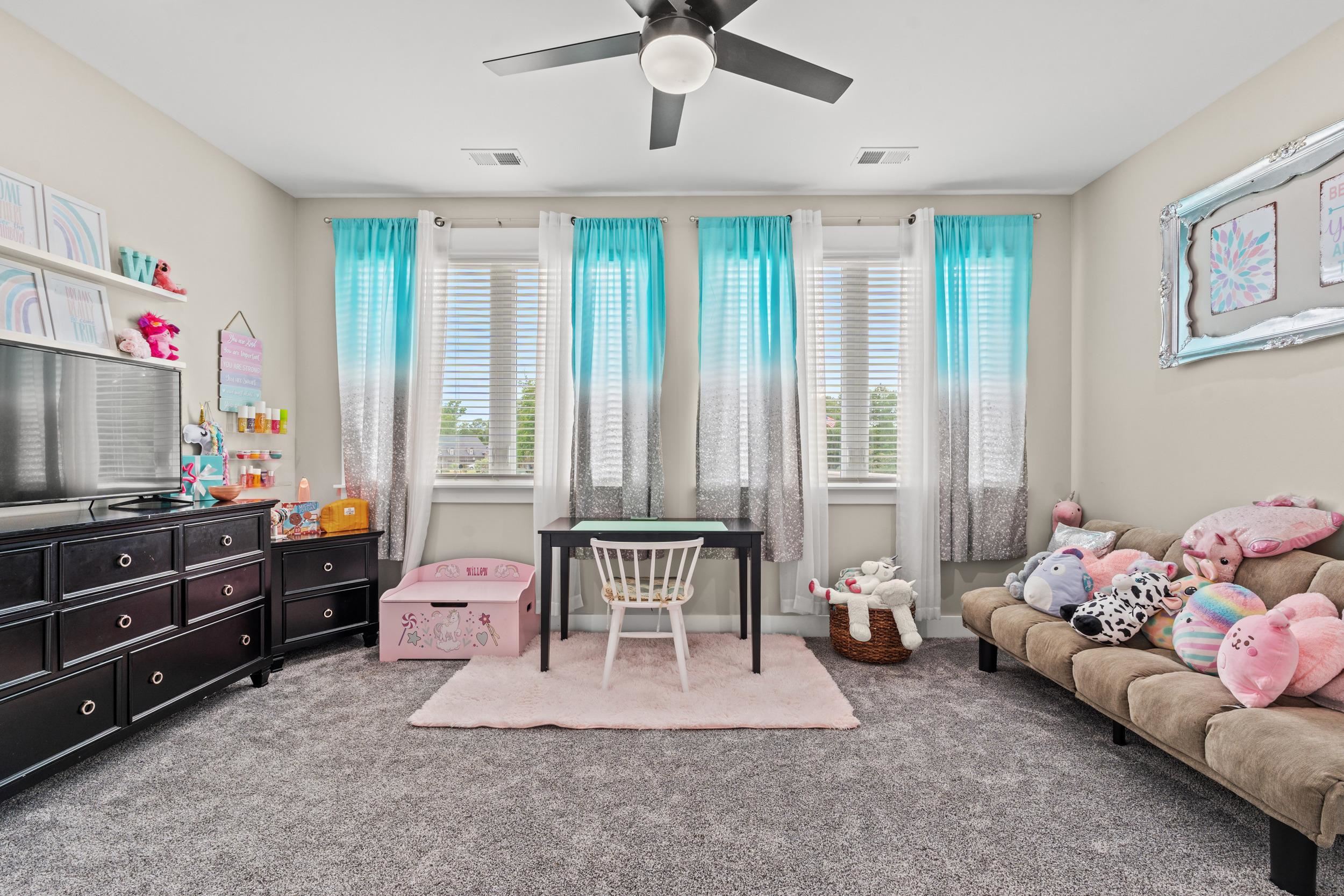 411 Chamberlin Road Myrtle Beach, SC 29588 - Photo 23 of 40 Living room featuring carpet flooring and ceiling fan