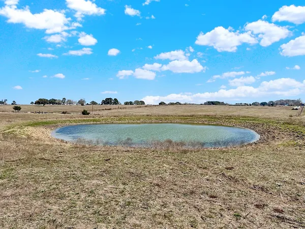 a view of an ocean and city
