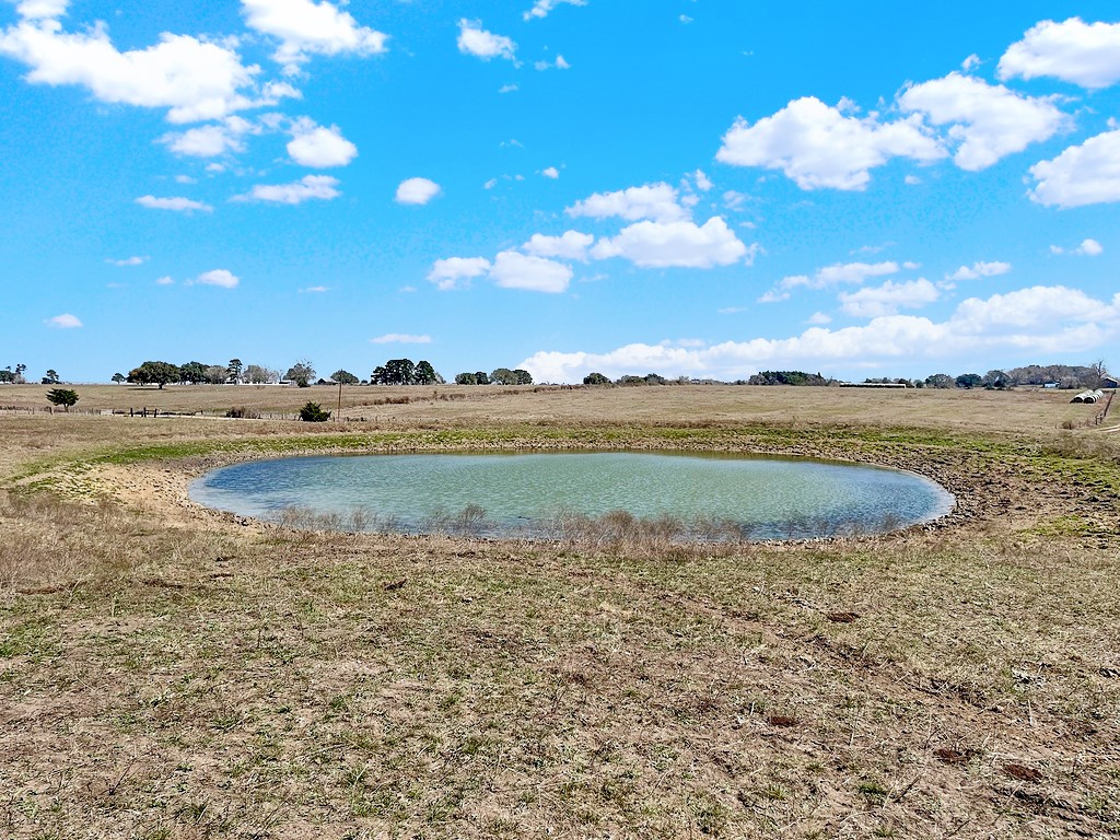 a view of an ocean and city