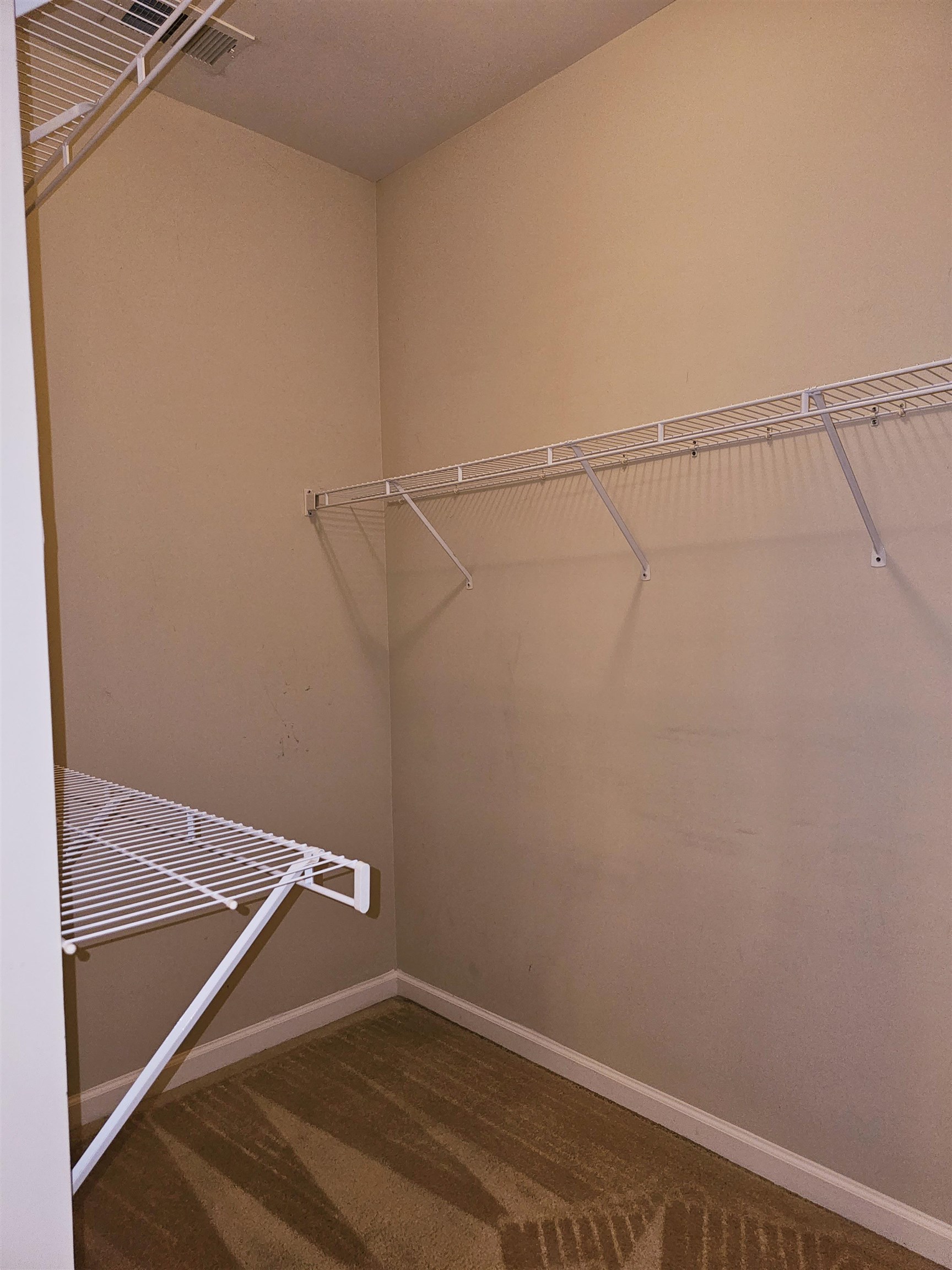 1832 North Houston Levee Road Cordova, TN 38016 - Photo 19 of 23 a view of a room with racks on the wall