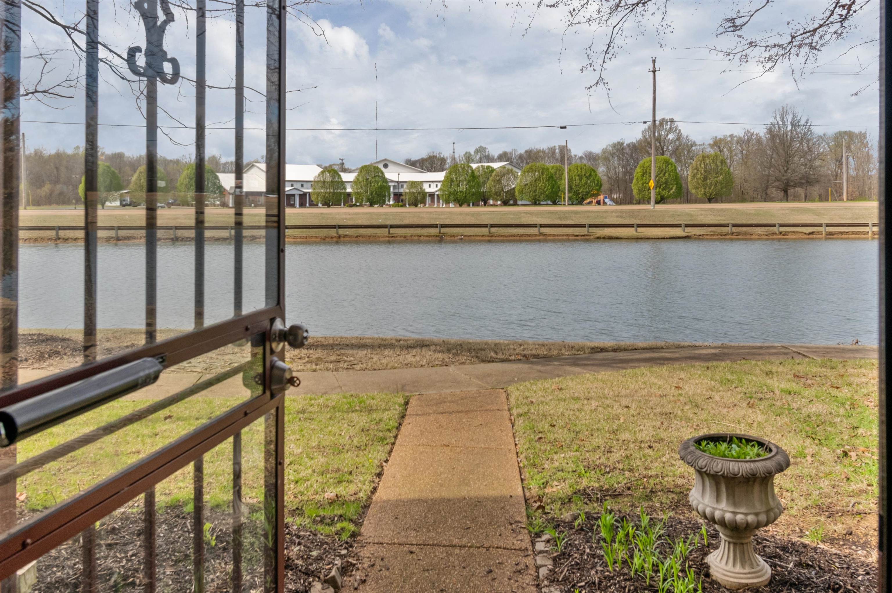 1832 North Houston Levee Road Cordova, TN 38016 - Photo 4 of 23 a view of a balcony with chair and table