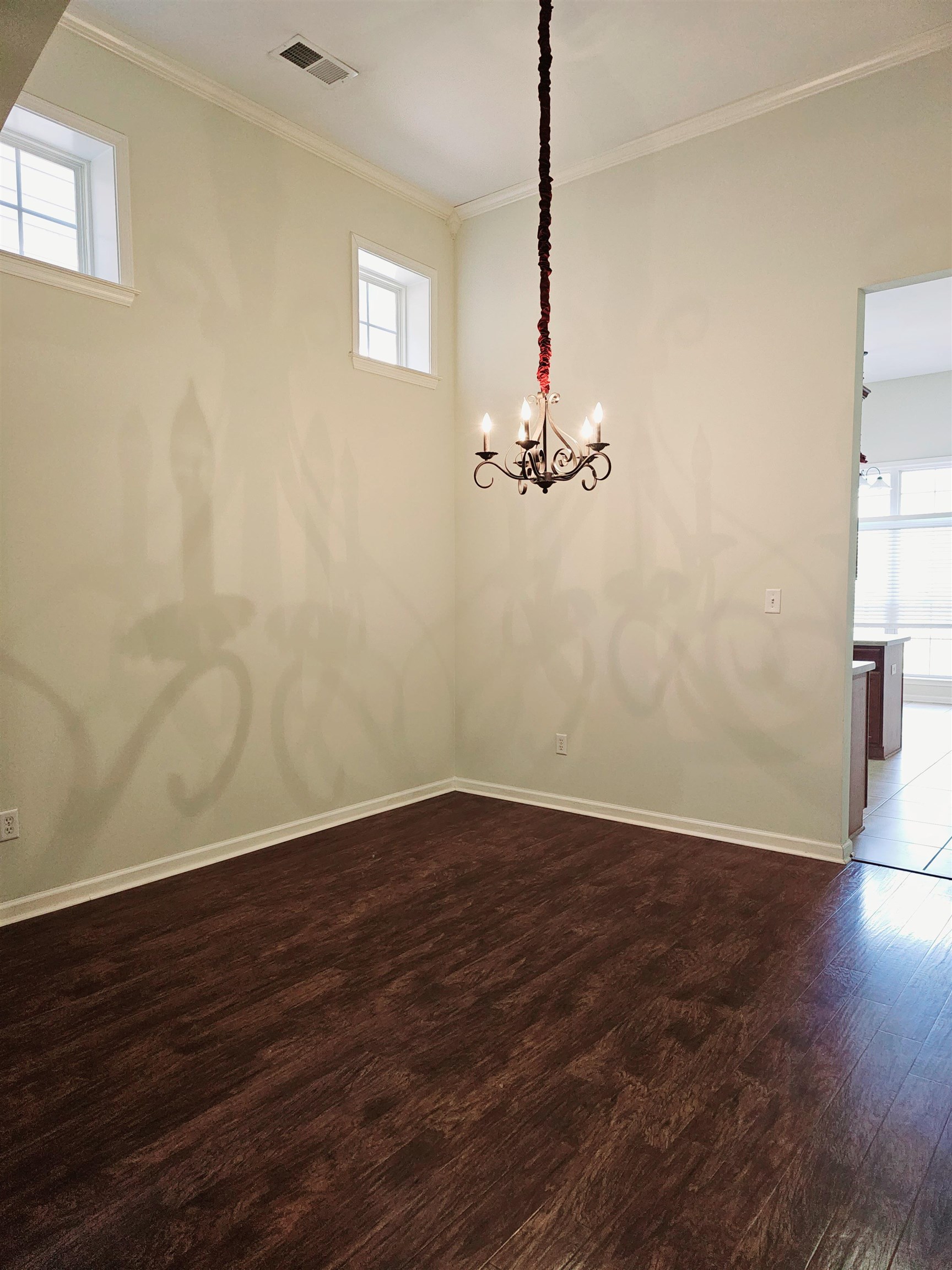 1832 North Houston Levee Road Cordova, TN 38016 - Photo 7 of 23 a view of a room with wooden floor and air conditioner