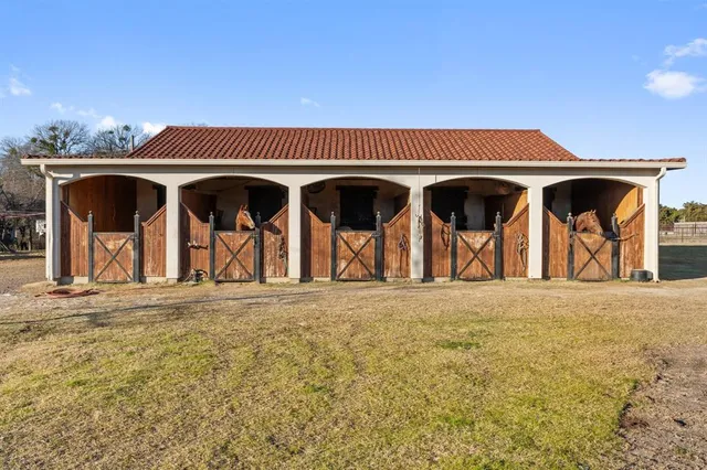 a view of a car parked in front of a building
