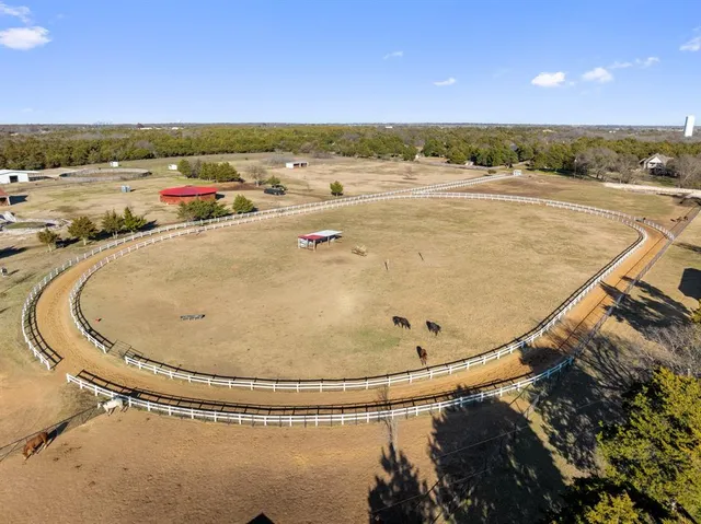 a view of a city with mountains in the background