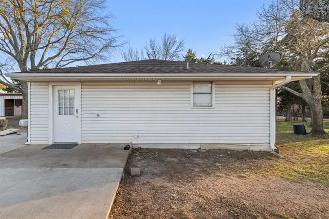 a view of a house with a garage