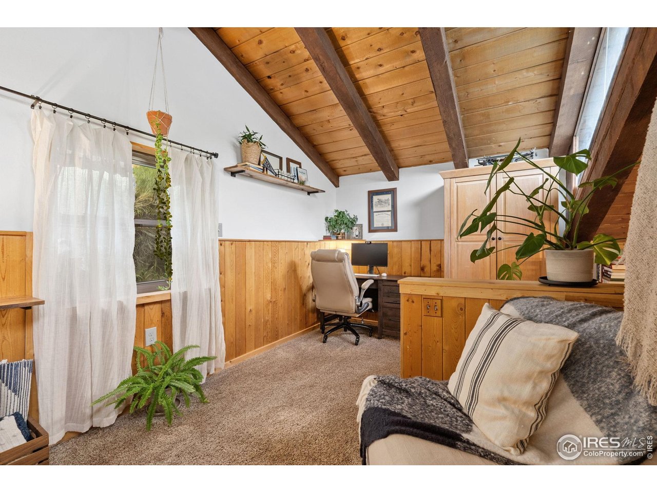 32224 Poudre Canyon Road Bellvue, CO 80512 - Photo 24 of 34 a living room with furniture and a window