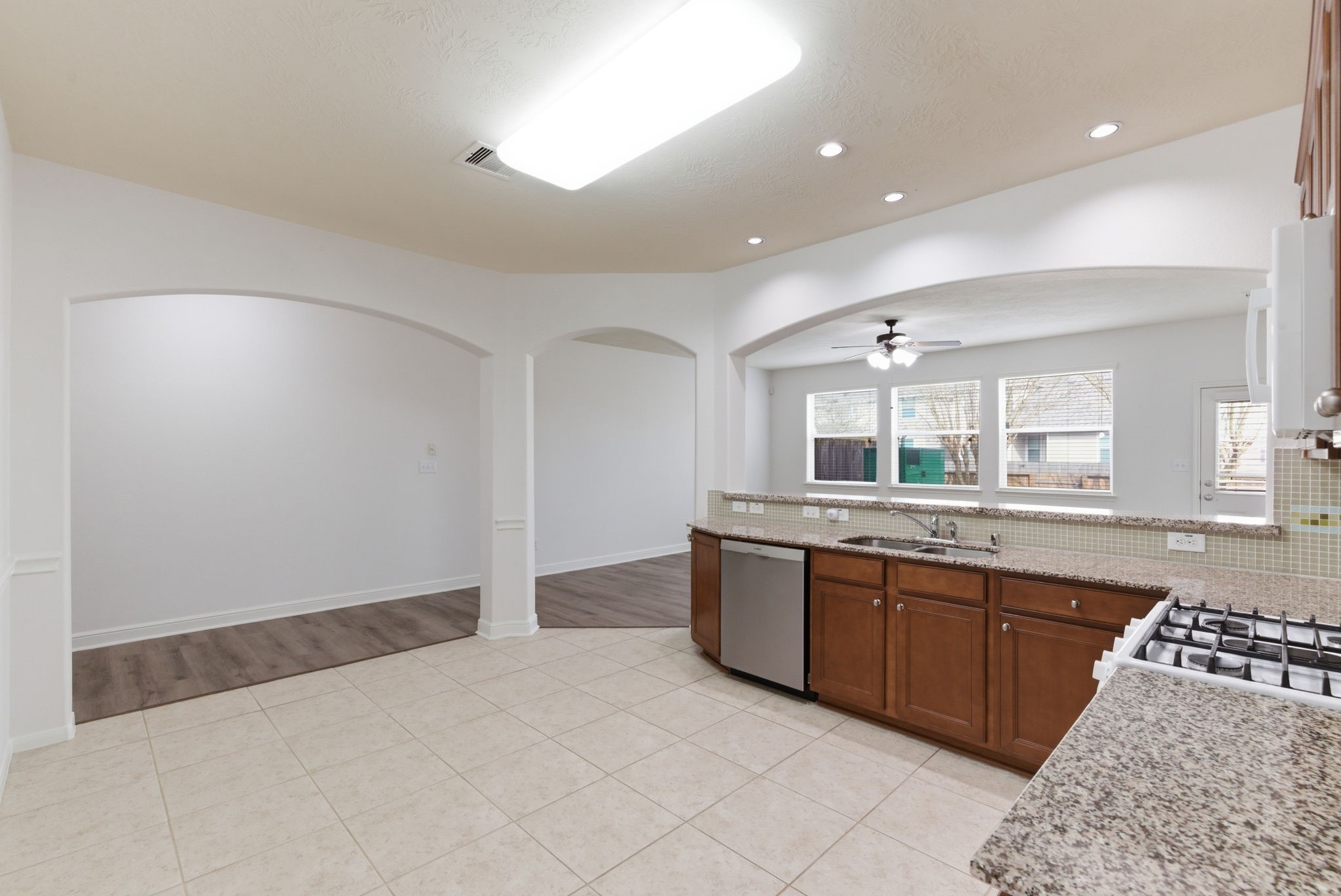 10510 Day Trail Lane Spring, TX 77379 - Photo 9 of 23 Enjoy effortless serving and casual dining with clear sightlines into the main living zones.
