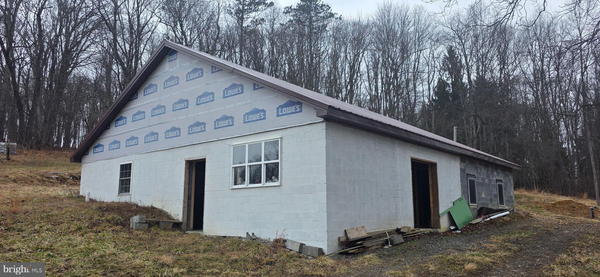 3395 Fingerboard Road Oakland, MD 21550 - Photo 14 of 20 a view of a house with a yard