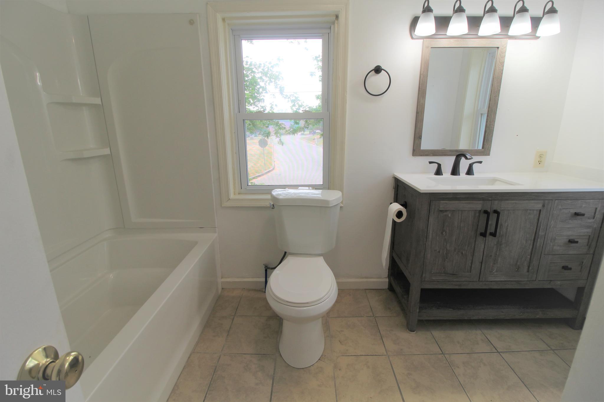 535 West Church Road Ephrata, PA 17522 - Photo 11 of 12 a bathroom with a sink toilet and shower