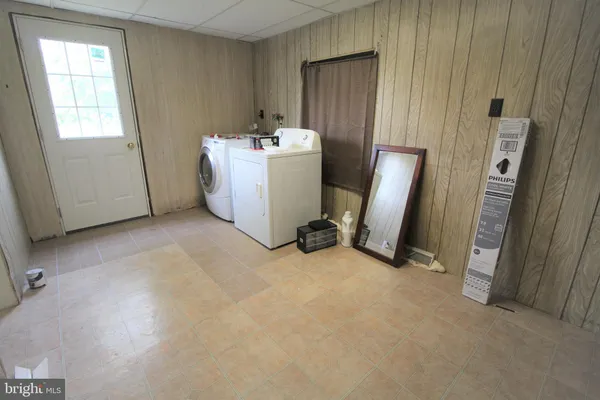 a view of a room with a window