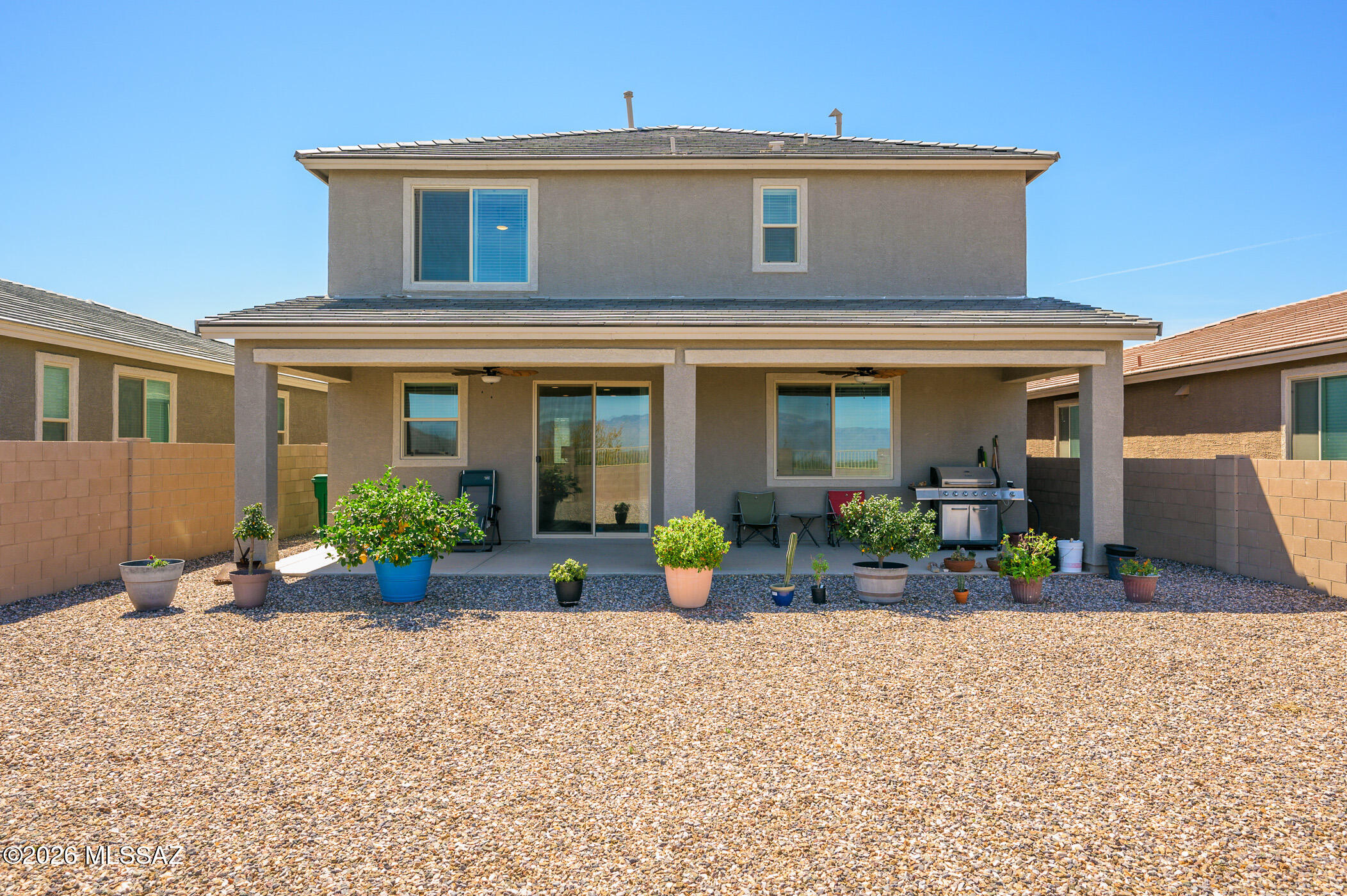 12092 East Ryscott Circle Vail, AZ 85641 - Photo 44 of 49 a view of a house with a patio