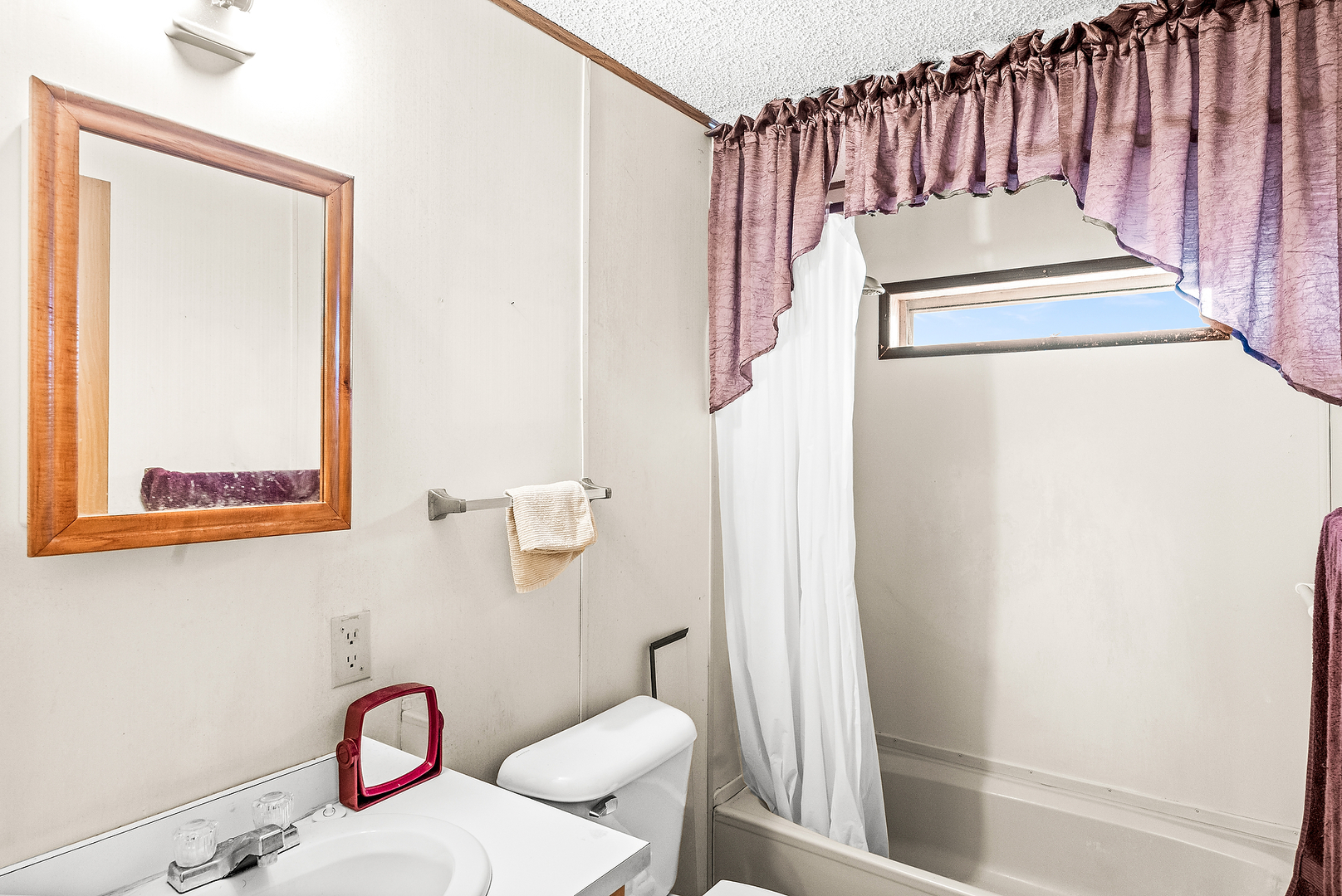 1 Christine Way Bloomington, IL 61701 - Photo 6 of 17 a bathroom with a sink and a mirror