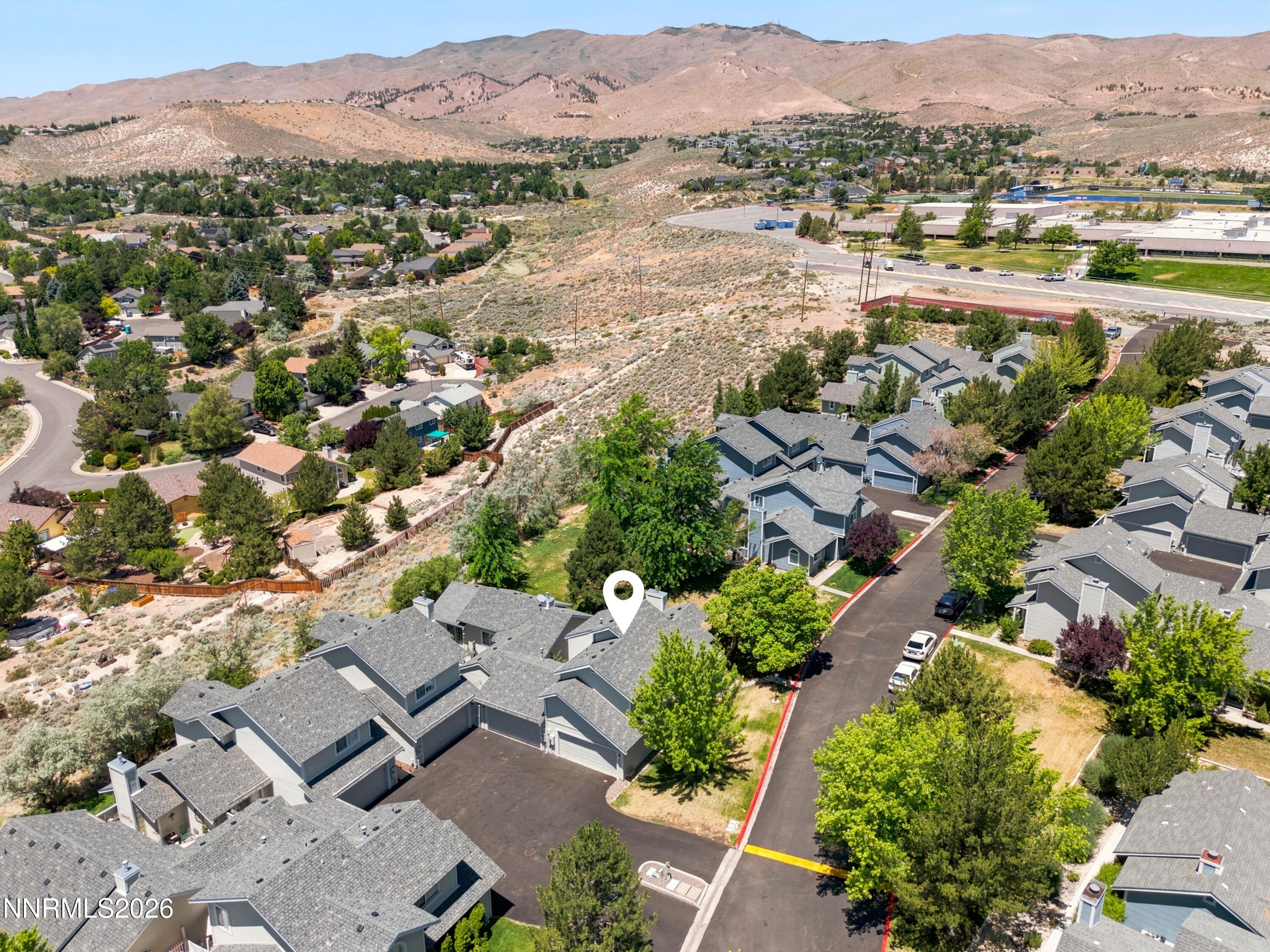 1899 Tuolumne Drive Reno, NV 89523 - Photo 42 of 44 an aerial view of residential house with outdoor space and mountain view