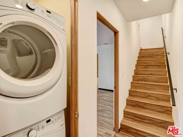 a view of entryway with washer and dryer