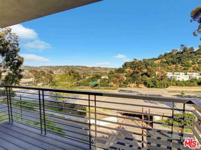 a view of city from a balcony
