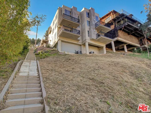 a view of a large building with many windows