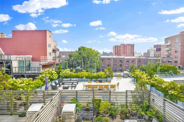 a view of a city with tall buildings