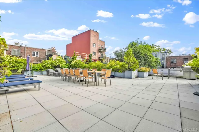 a view of a terrace with sitting area