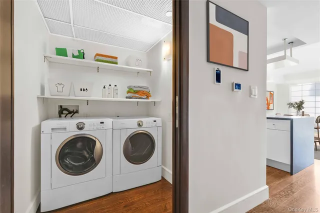 a utility room with dryer and washer