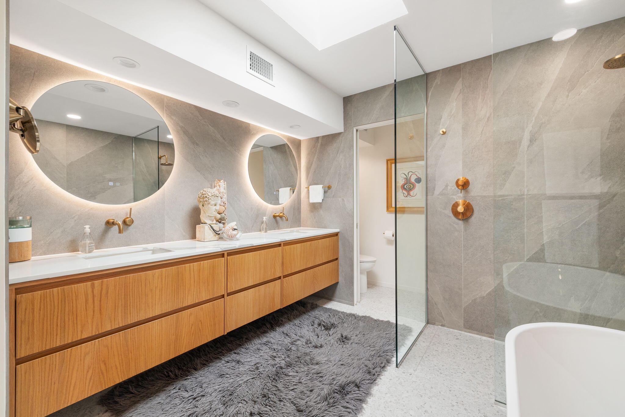 2691 Kings Road East Palm Springs, CA 92264 - Photo 20 of 45 a bathroom with a double vanity sink mirror and shower