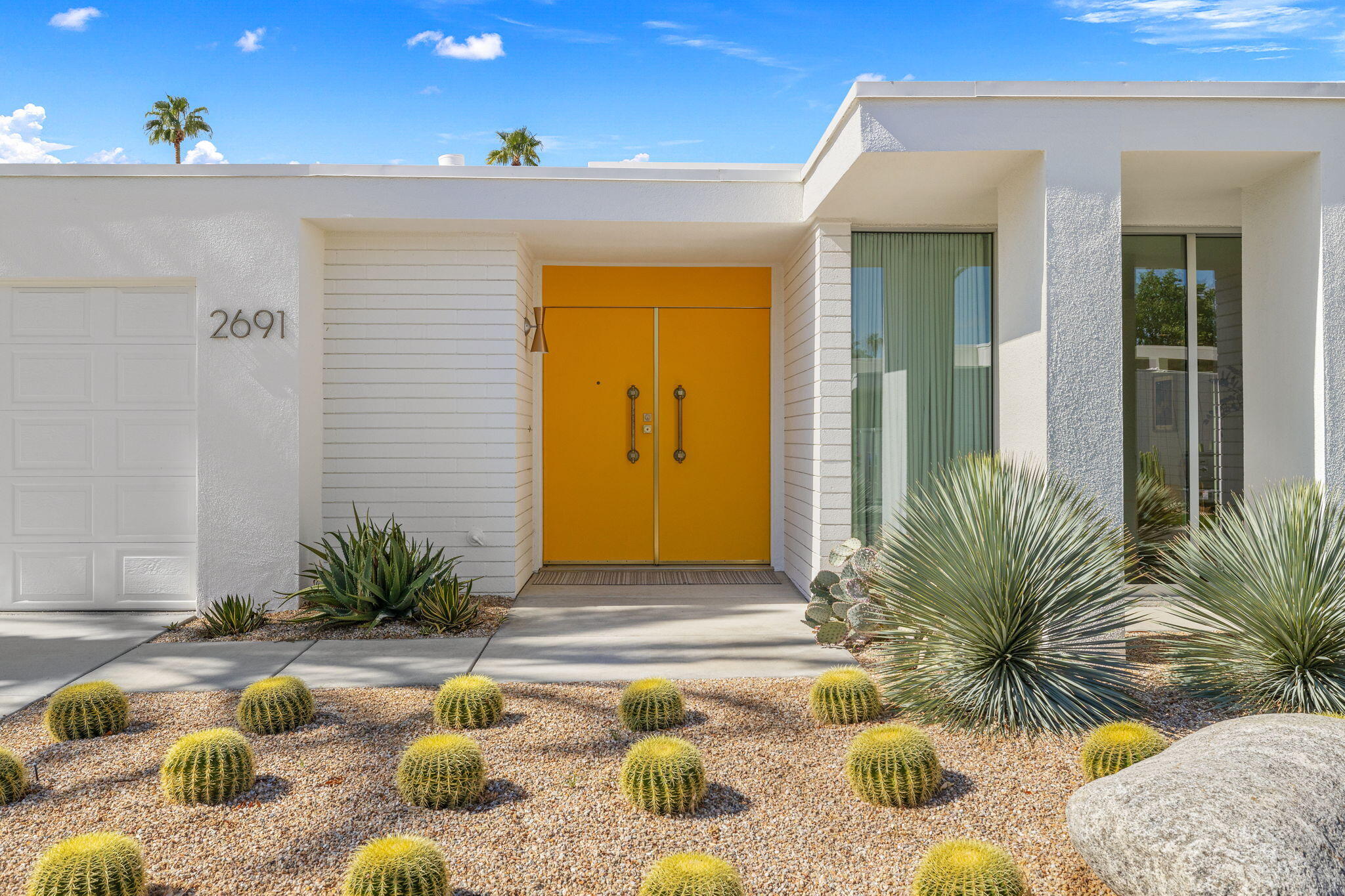 2691 Kings Road East Palm Springs, CA 92264 - Photo 2 of 45 a view of swimming pool with outdoor seating