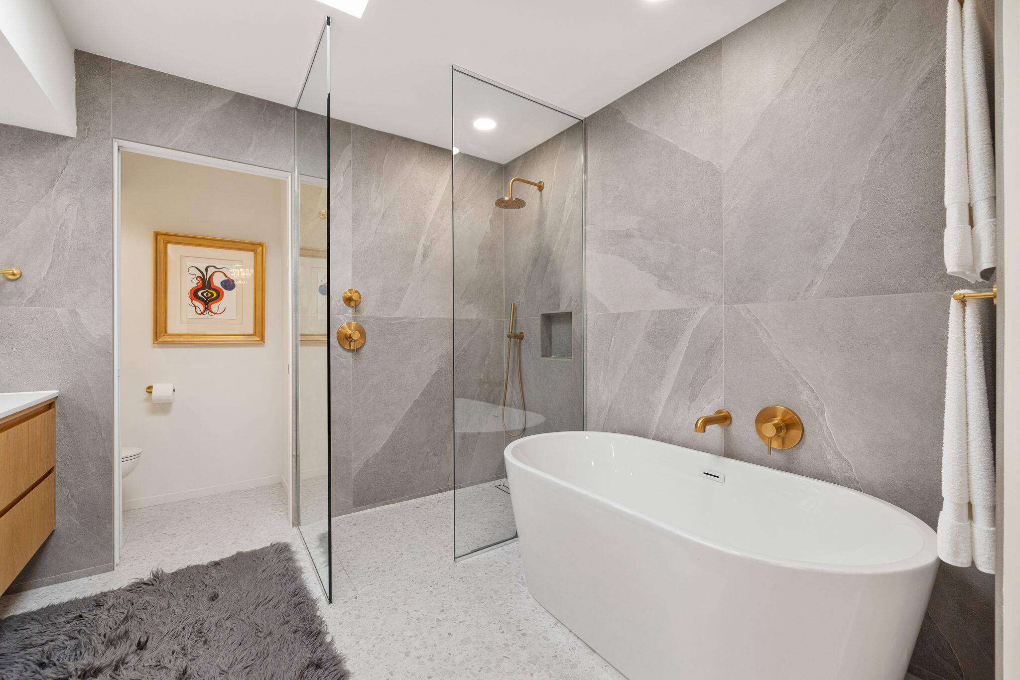 2691 Kings Road East Palm Springs, CA 92264 - Photo 21 of 45 a bathroom with a bathtub and a shower