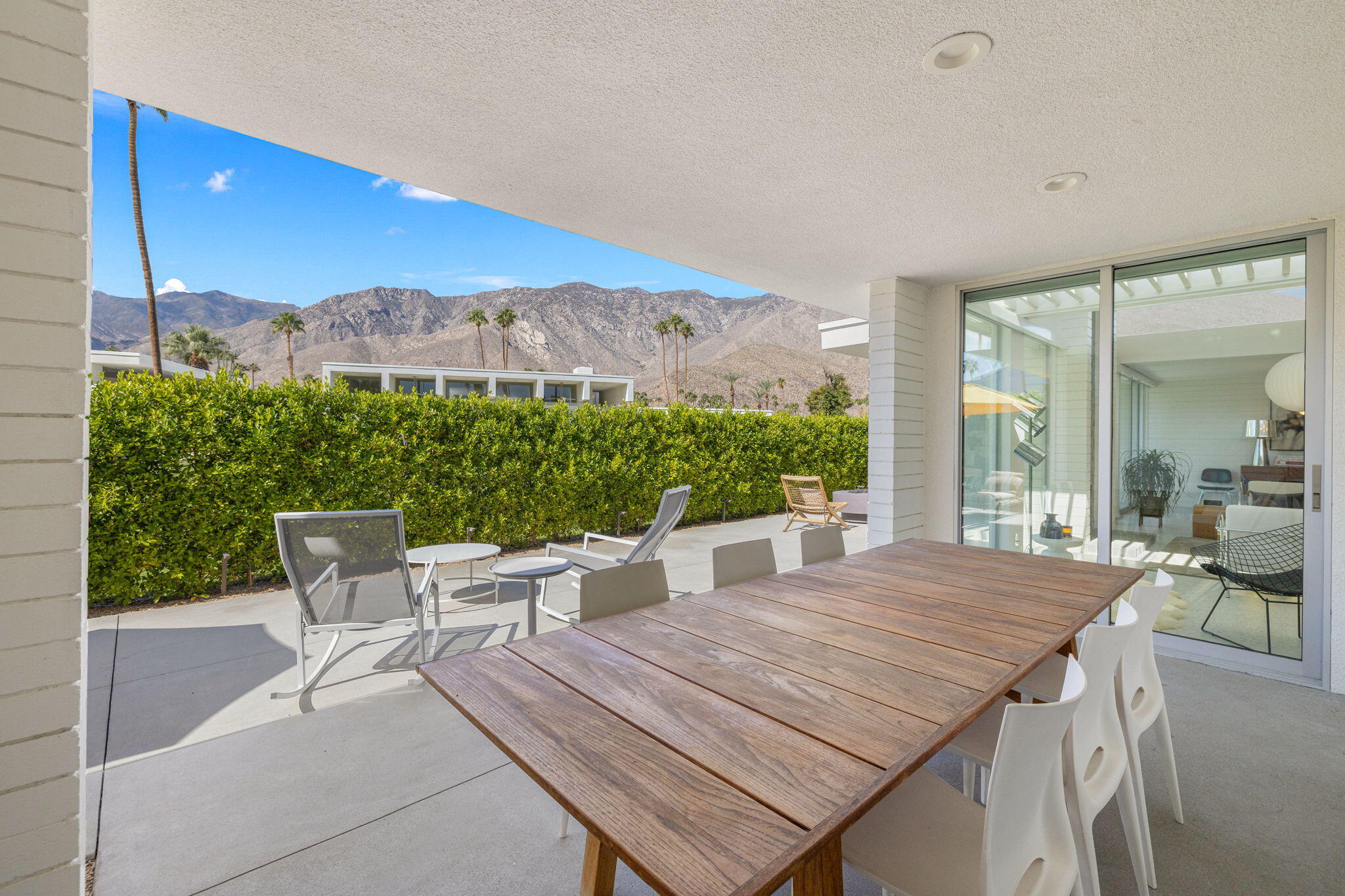 2691 Kings Road East Palm Springs, CA 92264 - Photo 37 of 45 a view of an outdoor dining space with furniture