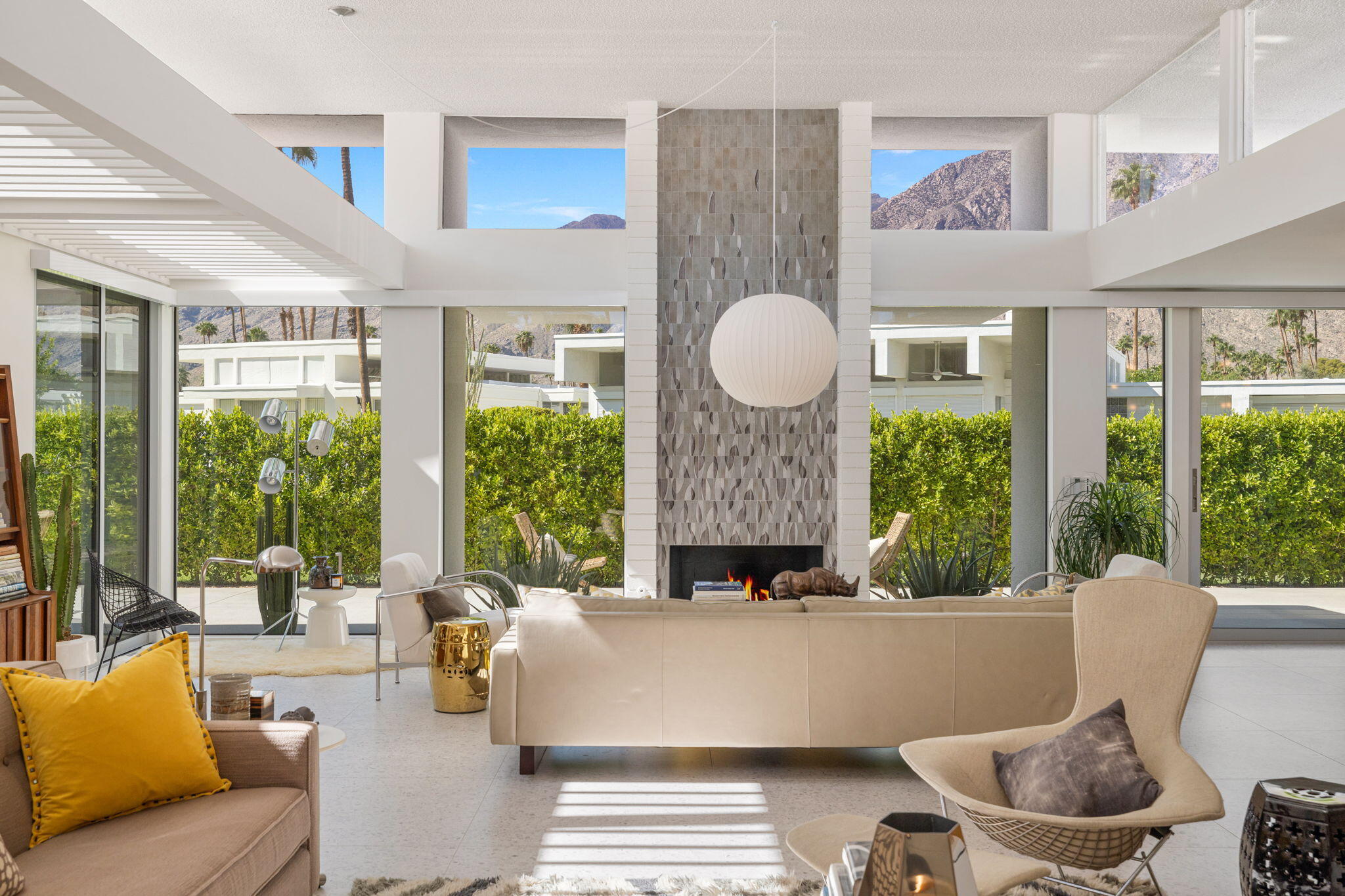 2691 Kings Road East Palm Springs, CA 92264 - Photo 8 of 45 a living room with furniture and a large window
