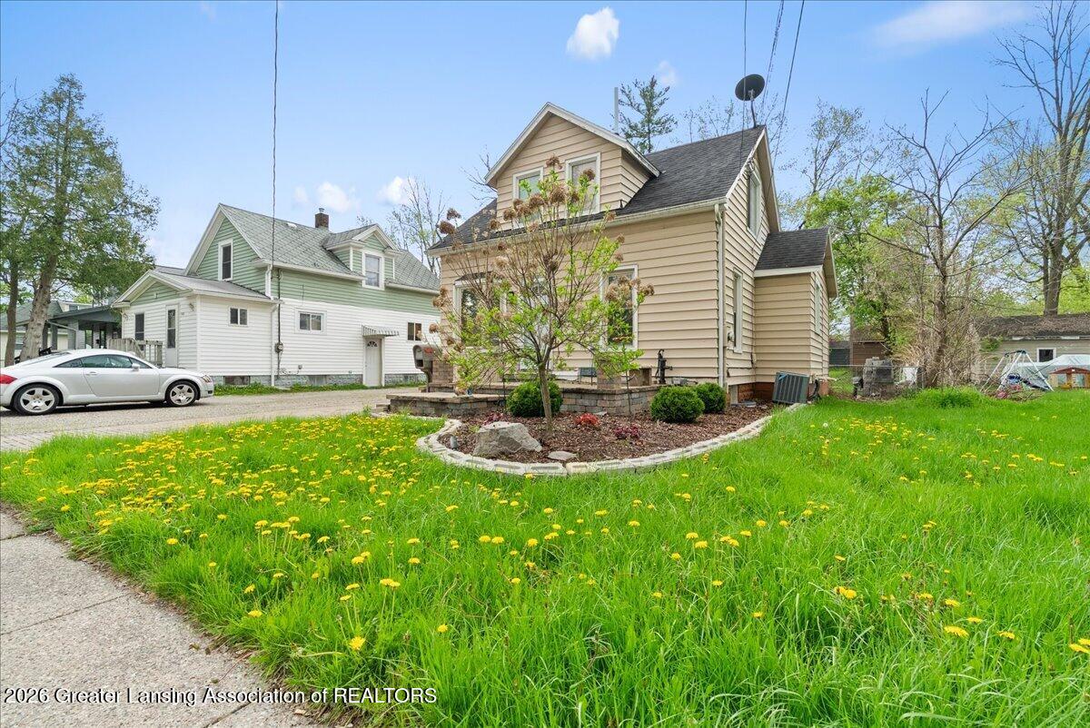 306 East Cavanaugh Road Lansing, MI 48910 - Photo 4 of 29 FRONT SIDE