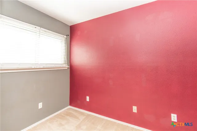 a view of a small space with a window