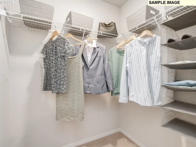 a picture of a room with a white wall and a picture