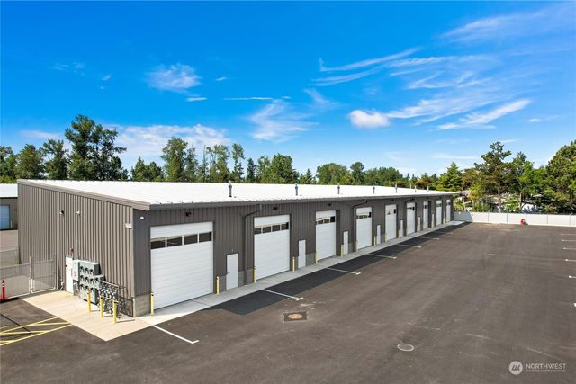 a view of a balcony with an tree