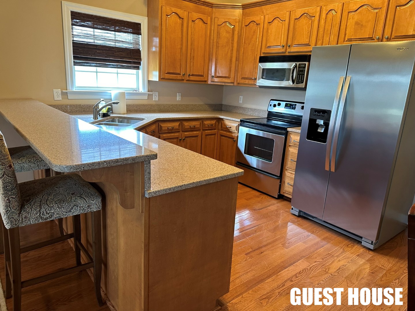 9081 Concord Road Rockvale, TN 37153 - Photo 65 of 68 a kitchen with stainless steel appliances granite countertop a refrigerator a sink a stove and island