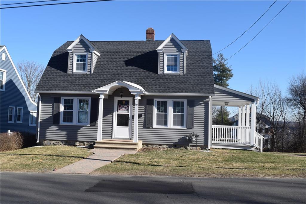 59 Chambers Street Waterbury, CT 06708 - Photo 1 of 1 a front view of a house with a yard