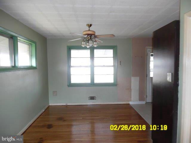 837 Lannerton Road Baltimore, MD 21220 - Photo 4 of 14 a view of empty room with window