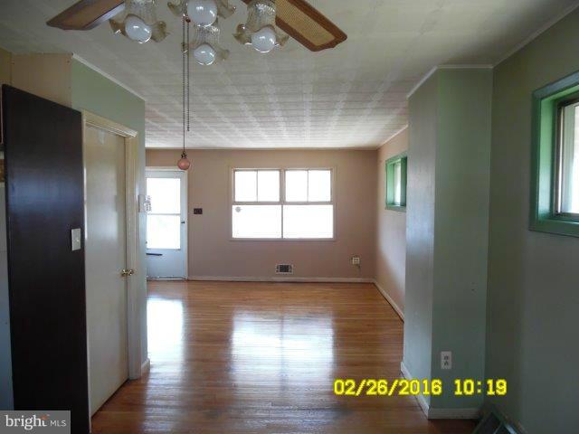 837 Lannerton Road Baltimore, MD 21220 - Photo 5 of 14 a view of empty room with window