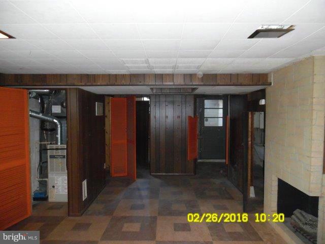 837 Lannerton Road Baltimore, MD 21220 - Photo 8 of 14 a view of a refrigerator in a hall