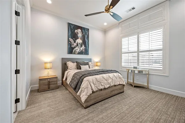 a bathroom with a granite countertop toilet a sink and a mirror