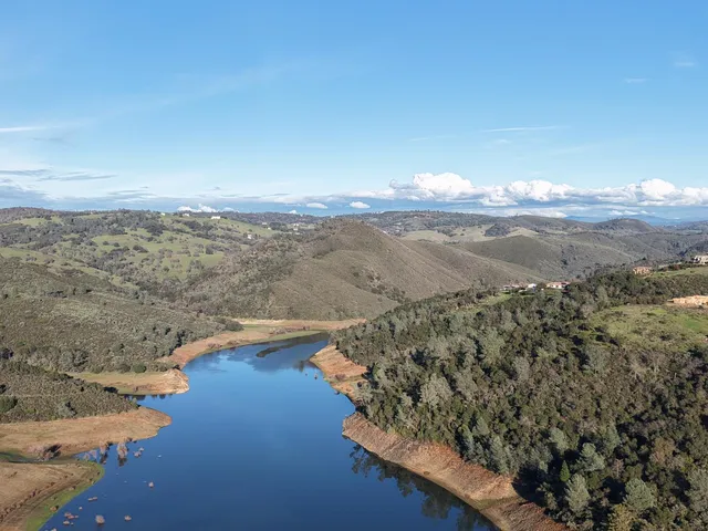 a view of lake view with mountain