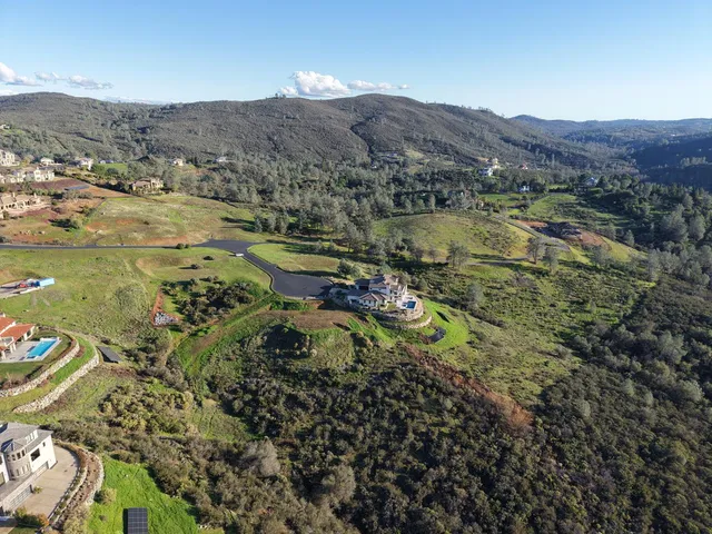 a view of a lake with mountains in the background