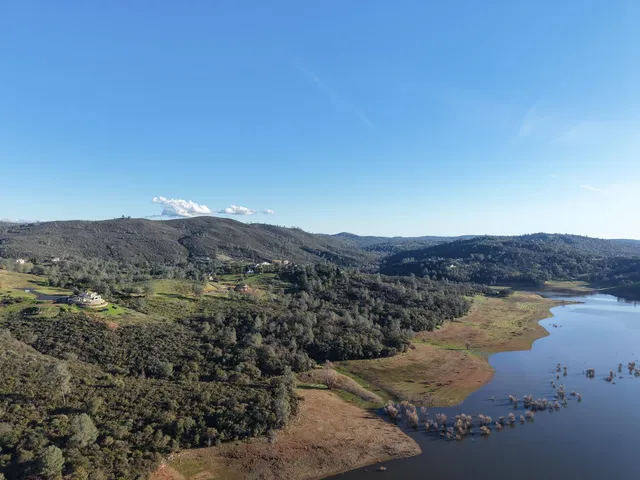 a view of lake with mountain