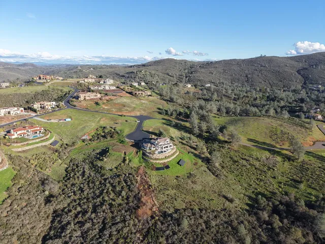 a view of a lake with mountains in the background