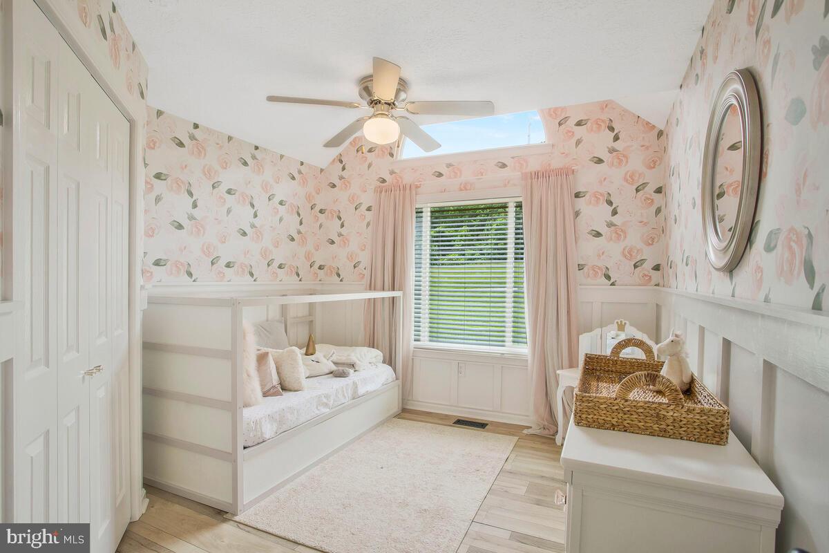 175-m F M F Bowen Road Huntingtown, MD 20639 - Photo 22 of 47 a bedroom with furniture and a large window