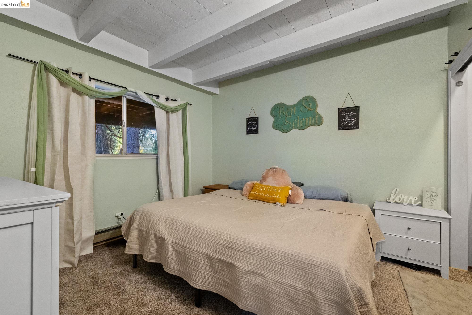 17851 Robin Road Twain Harte, CA 95383 - Photo 25 of 45 Bedroom with carpet flooring, beamed ceiling, and baseboard heating